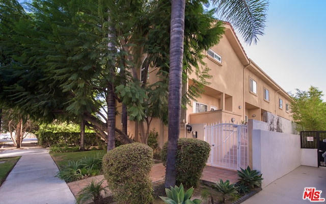 view of property exterior with a balcony