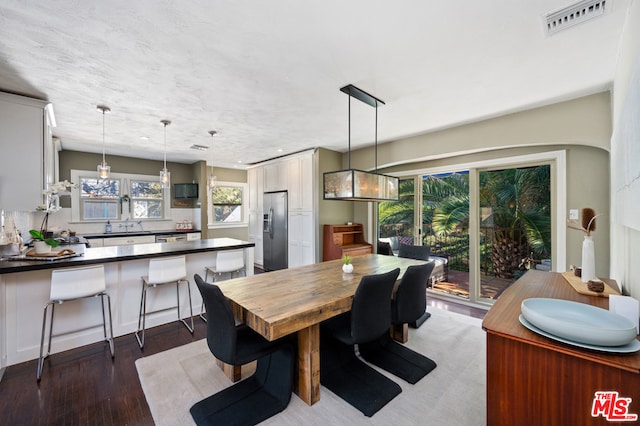 dining room featuring light wood-type flooring