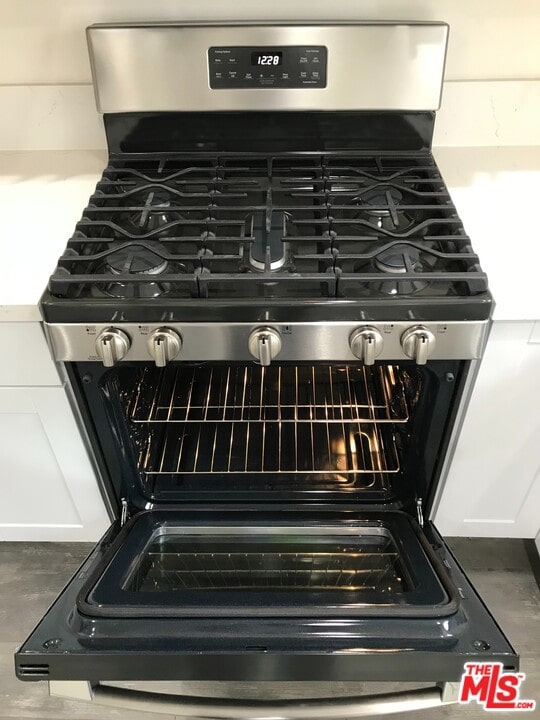 room details featuring stainless steel range with gas stovetop