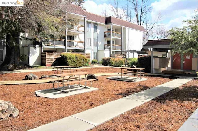 view of yard featuring a balcony