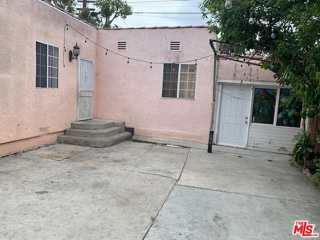 rear view of property with a patio area