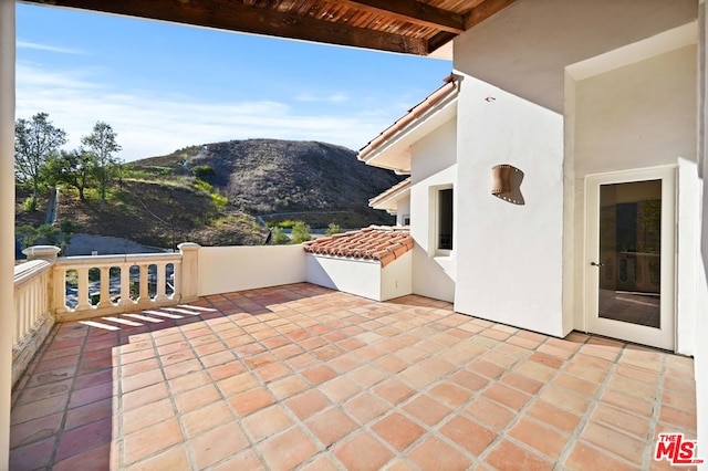 view of patio with a mountain view