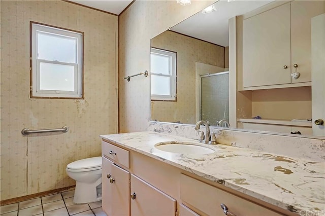 bathroom with tile flooring, oversized vanity, and toilet