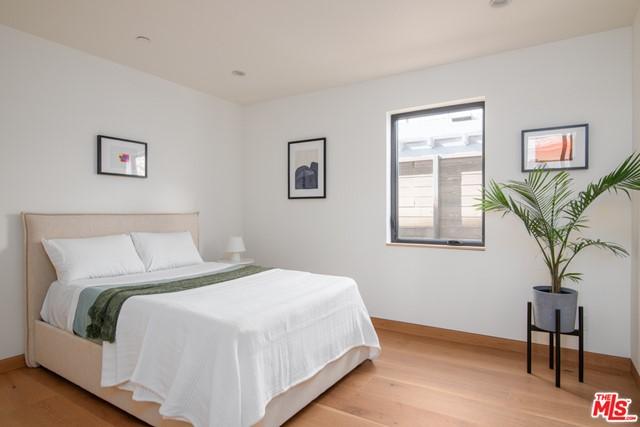 bedroom featuring light hardwood / wood-style flooring