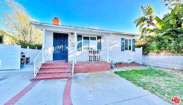 bungalow featuring a porch