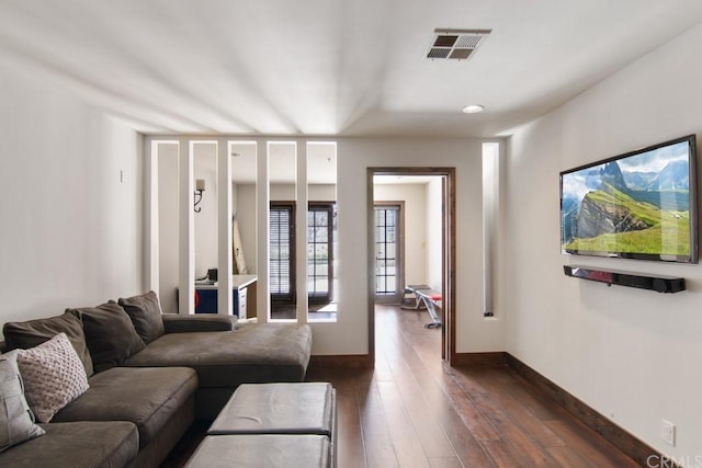 living room with dark wood-type flooring