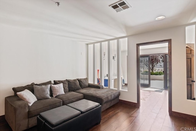 living room featuring dark hardwood / wood-style floors