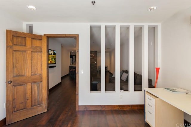 interior space with dark hardwood / wood-style flooring