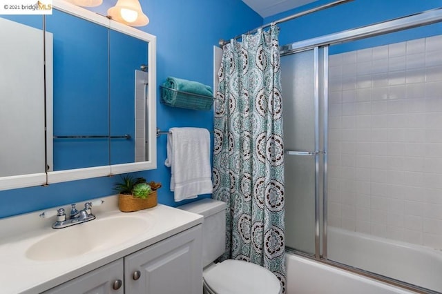 full bathroom with toilet, shower / bath combo with shower curtain, and large vanity