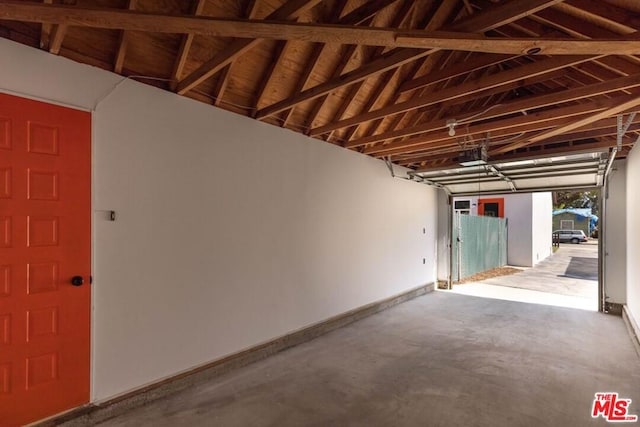 garage featuring wooden ceiling