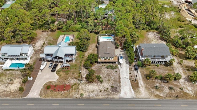 549 E Gulf Beach Dr, Saint George Islan, FL 32328 - aerial view of property and surrounding area with a pool area