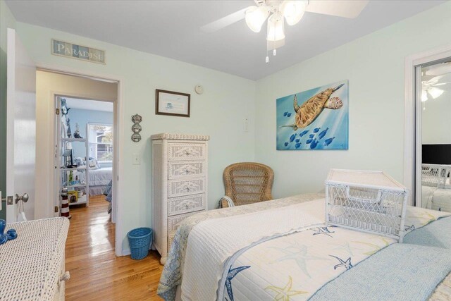 549 E Gulf Beach Dr, Saint George Islan, FL 32328 - bedroom featuring wood finished floors and ceiling fan