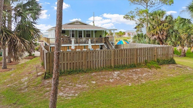 549 E Gulf Beach Dr, Saint George Islan, FL 32328 - view of yard with covered porch
