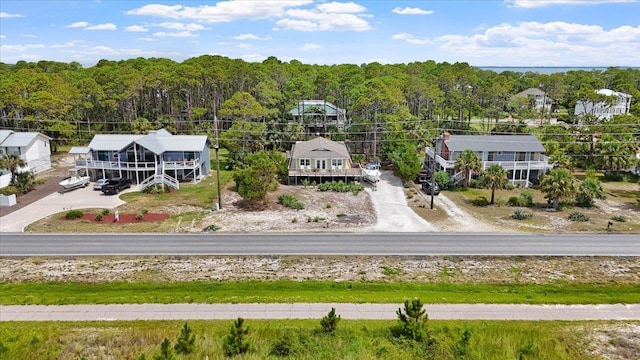 549 E Gulf Beach Dr, Saint George Islan, FL 32328 - aerial view of property and surrounding area with a forest