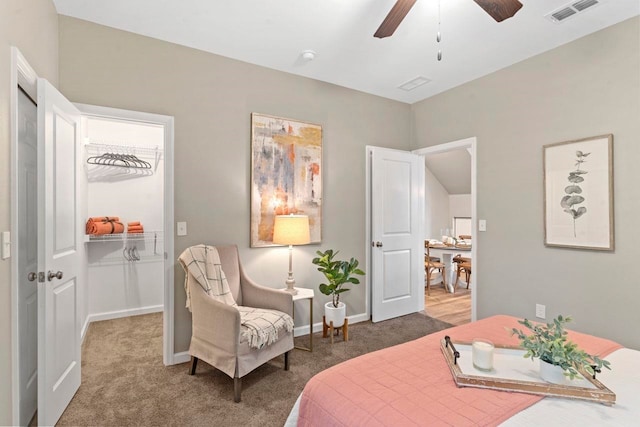 bedroom featuring ceiling fan and carpet floors