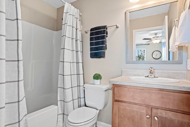 bathroom with vanity, ceiling fan, and toilet