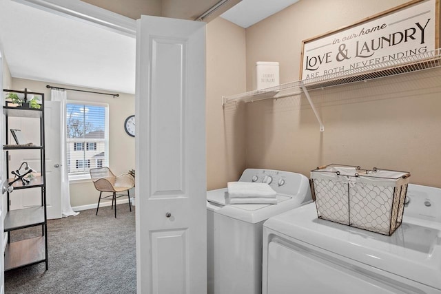 clothes washing area with carpet and washing machine and clothes dryer