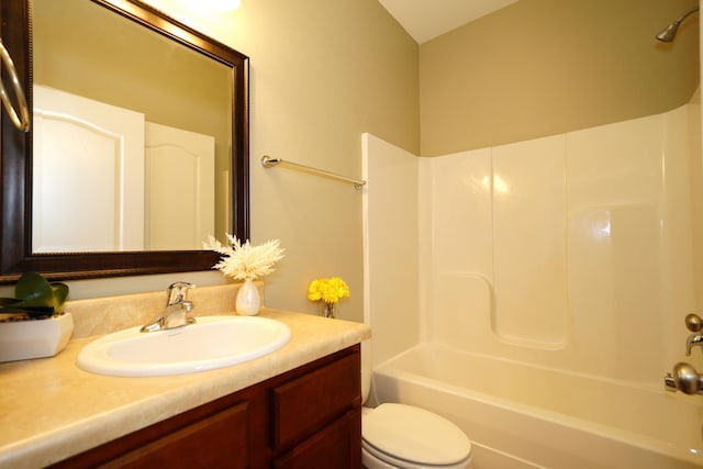 full bathroom with shower / bathing tub combination, vanity, and toilet