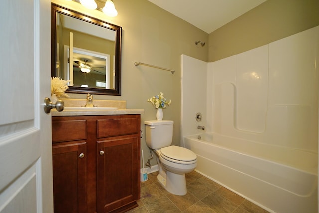 full bathroom with tile patterned flooring, vanity, bathtub / shower combination, and toilet