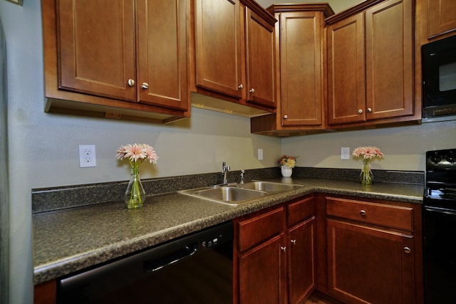 kitchen featuring black appliances and sink