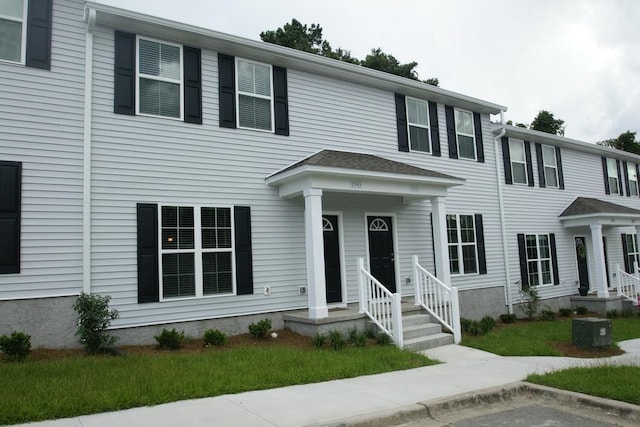 view of front facade with central AC