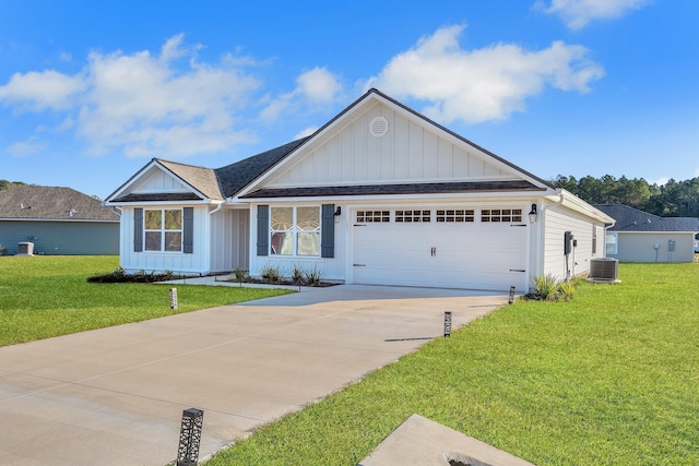 ranch-style house featuring a front lawn, a garage, and central air condition unit