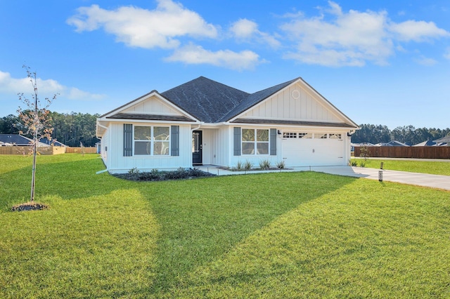 single story home with a garage and a front lawn