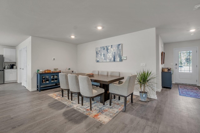 dining space featuring light hardwood / wood-style floors