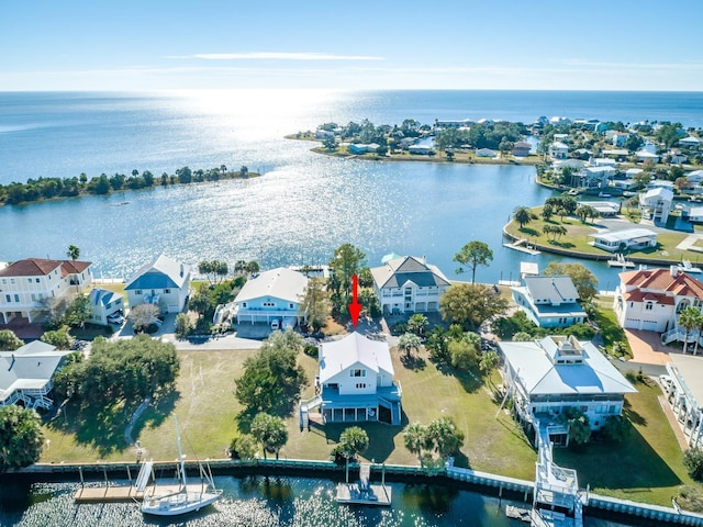 bird's eye view with a water view