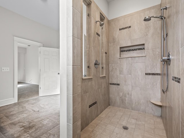 bathroom featuring tiled shower