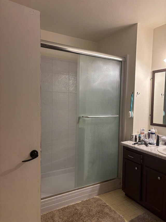 1208 Halifax Ct, Tallahassee, FL 32308 - full bathroom featuring tile patterned flooring, a shower stall, and vanity