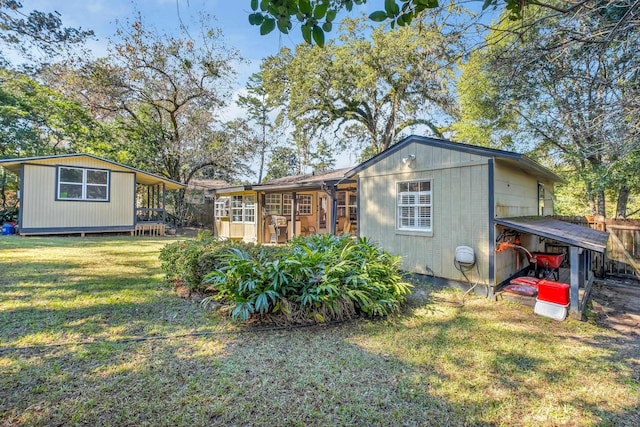 view of outbuilding with a yard