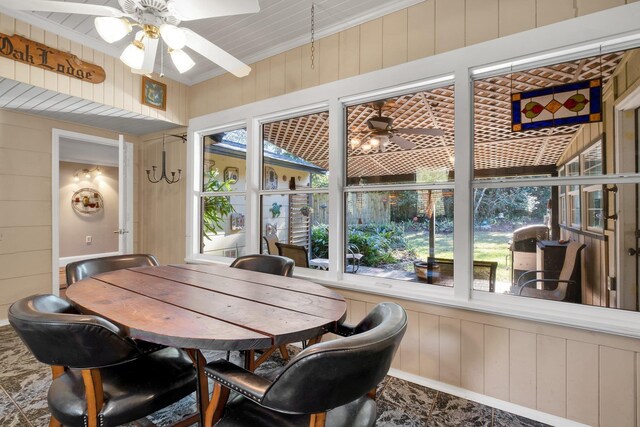 sunroom / solarium with ceiling fan