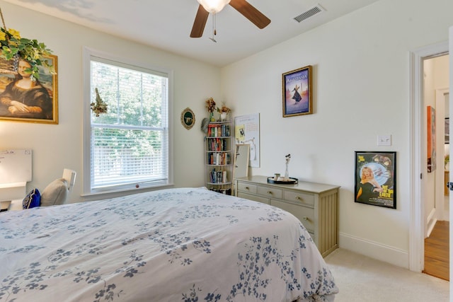 carpeted bedroom featuring ceiling fan