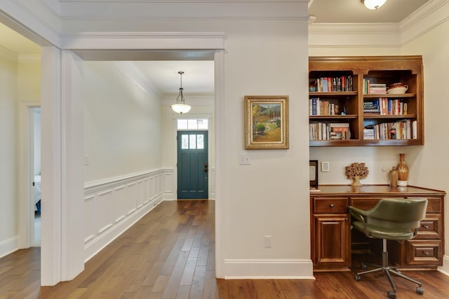 office space featuring hardwood / wood-style flooring and ornamental molding