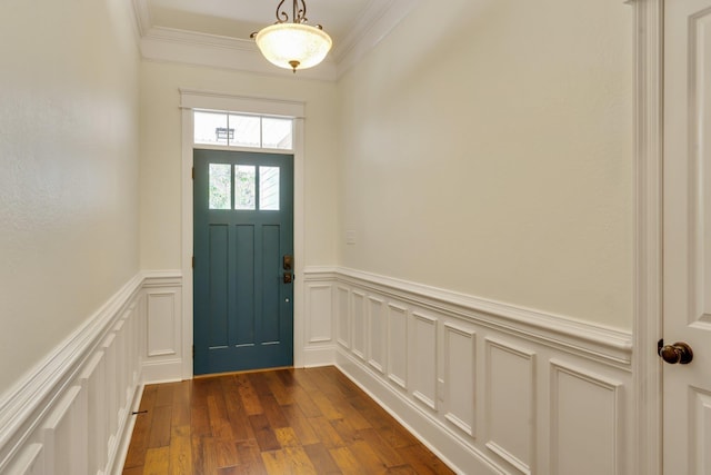 doorway to outside featuring crown molding and dark hardwood / wood-style flooring