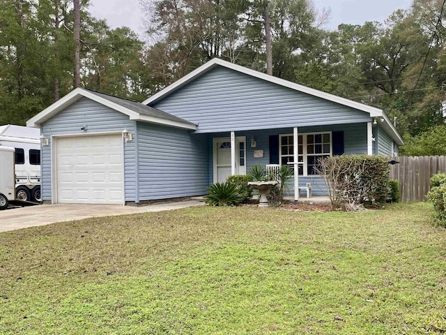 ranch-style house with a garage and a front lawn