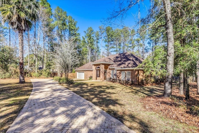 single story home with a garage