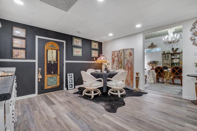 5902 Shady Rest Rd, Havana, FL 32333 - dining area featuring a paneled ceiling, wood finished floors, a chandelier, recessed lighting, and baseboards