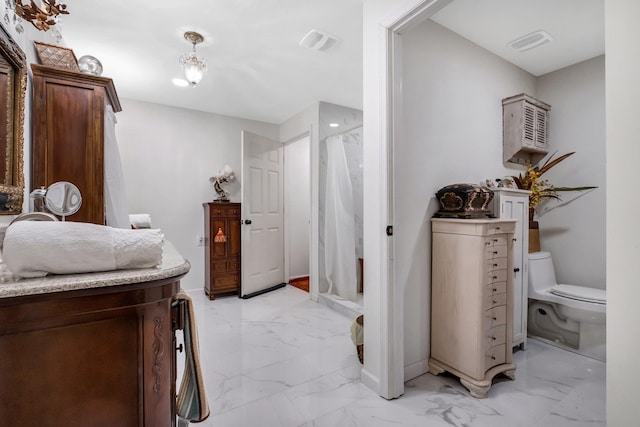 5902 Shady Rest Rd, Havana, FL 32333 - full bathroom with marble finish floors, toilet, baseboards, and a shower with shower curtain