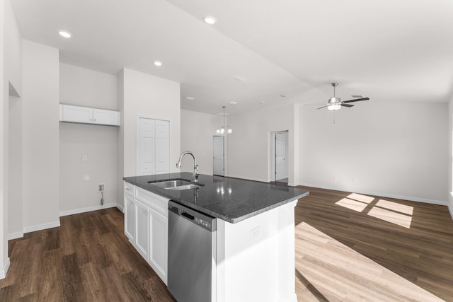 kitchen with a center island with sink, dishwasher, white cabinets, and sink