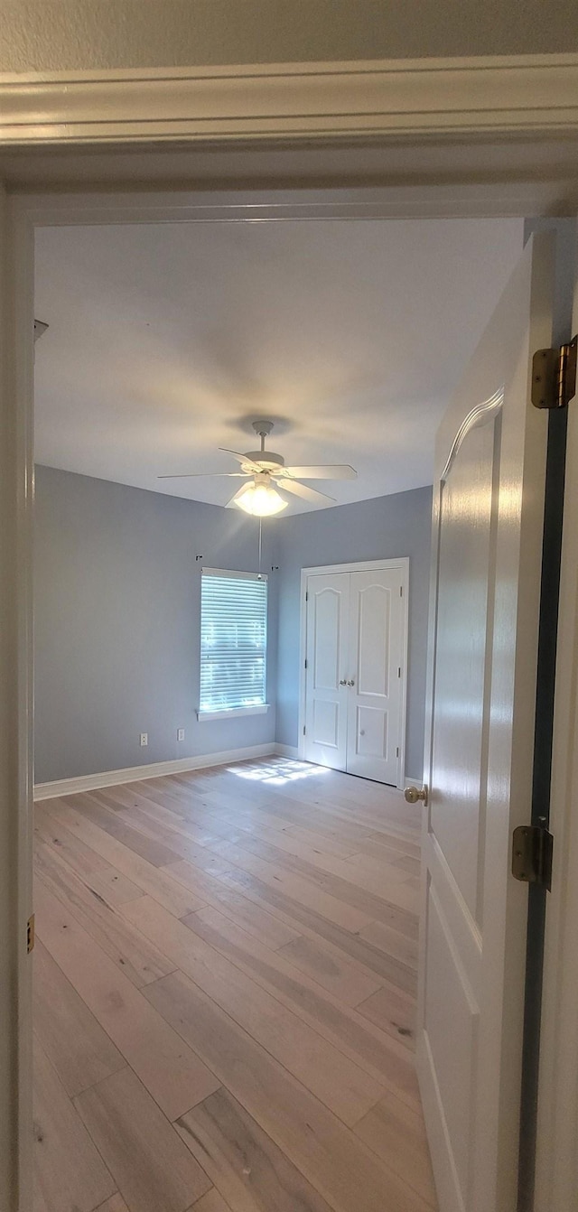 7972 Preservation Rd, Tallahassee, FL 32312 - unfurnished room featuring baseboards, light wood-style floors, and ceiling fan
