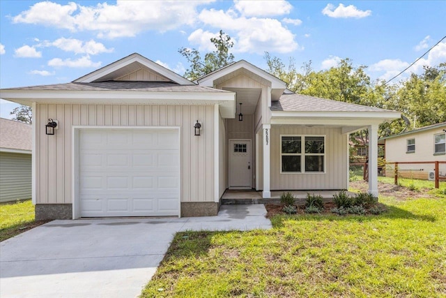 single story home with a front lawn and a garage