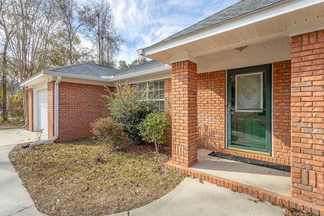 entrance to property with a garage