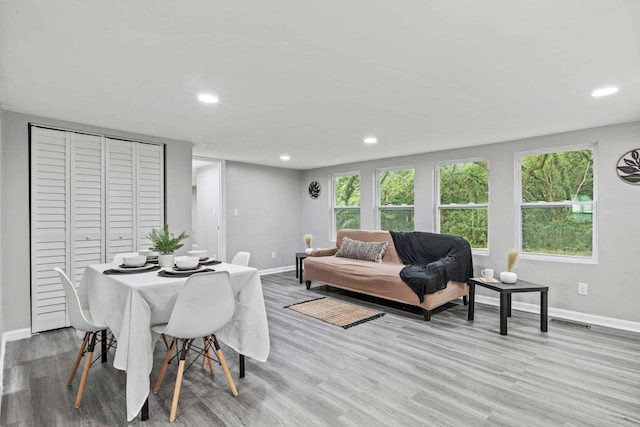 dining area with light wood-type flooring