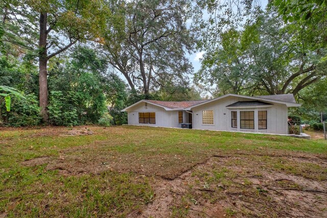 exterior space with a front yard