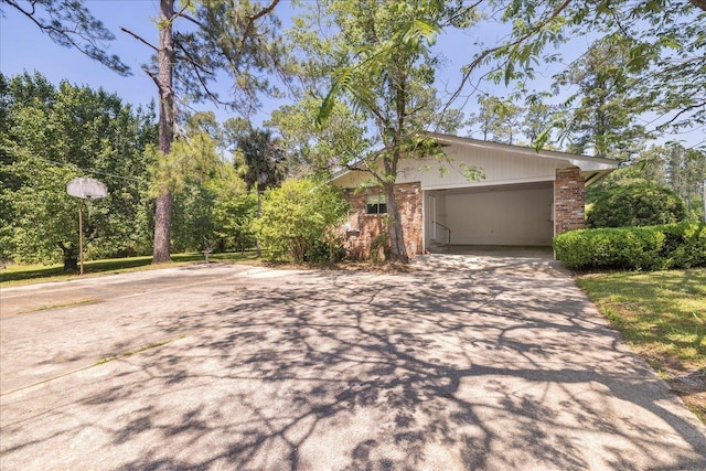 823 Salter Rd, Quincy, FL 32352 - view of property exterior with driveway and brick siding