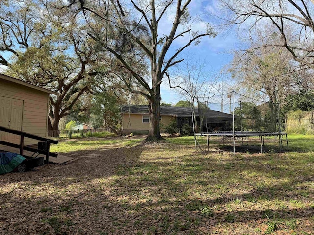 view of yard featuring a trampoline