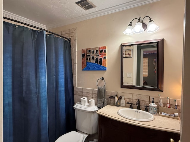 bathroom featuring vanity, visible vents, curtained shower, crown molding, and toilet