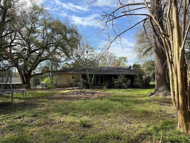 view of yard featuring a trampoline